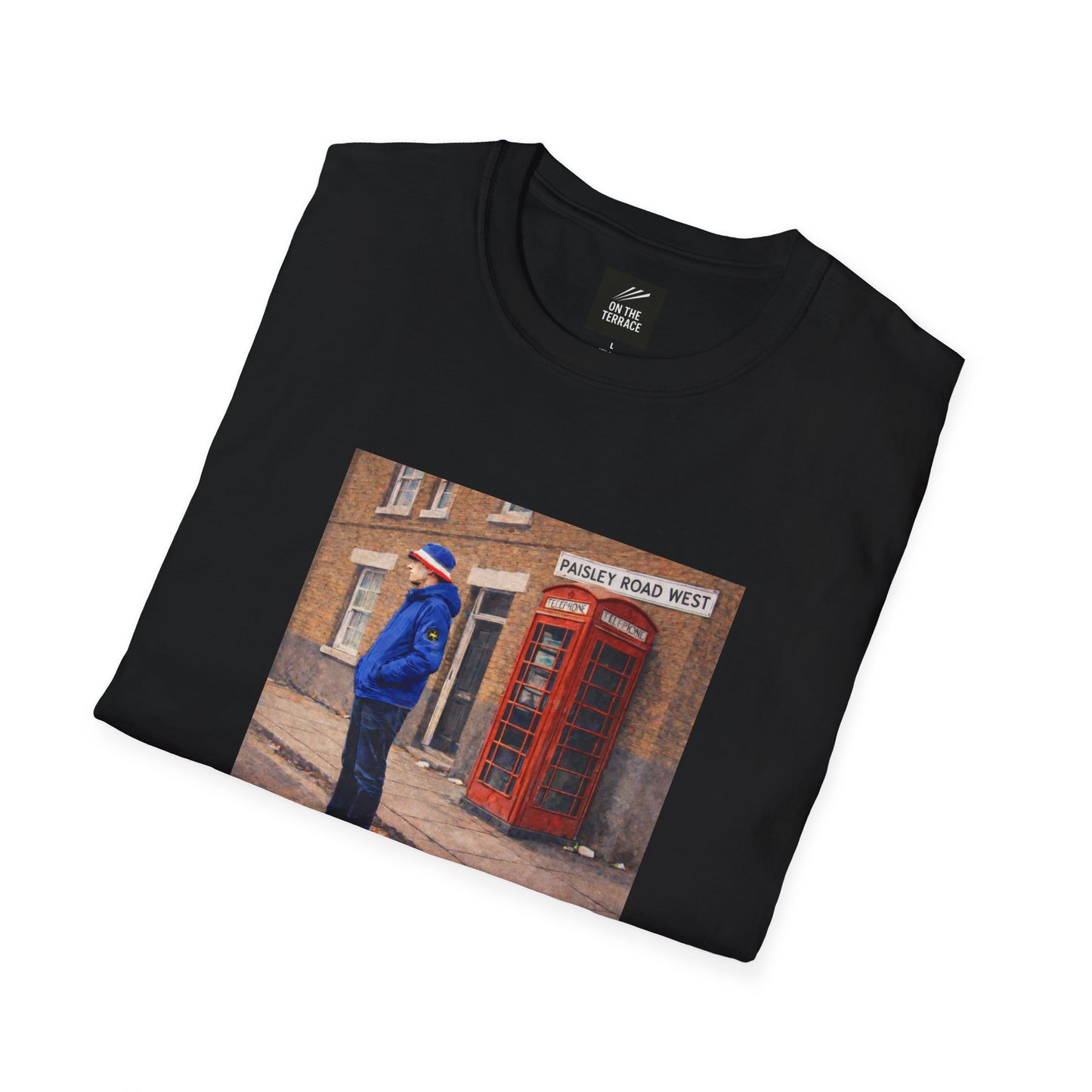 Black t-shirt with a printed design of a person in a blue jacket and red phone box on a white background