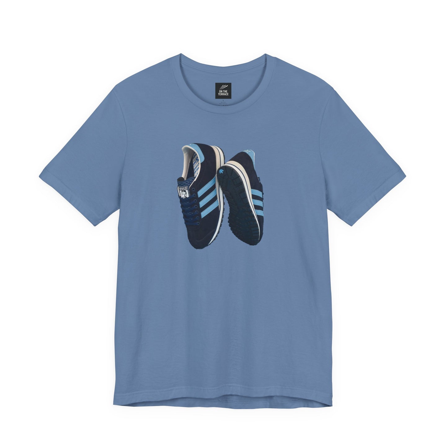 Blue T-shirt with graphic print of blue and black running shoes with light blue stripes