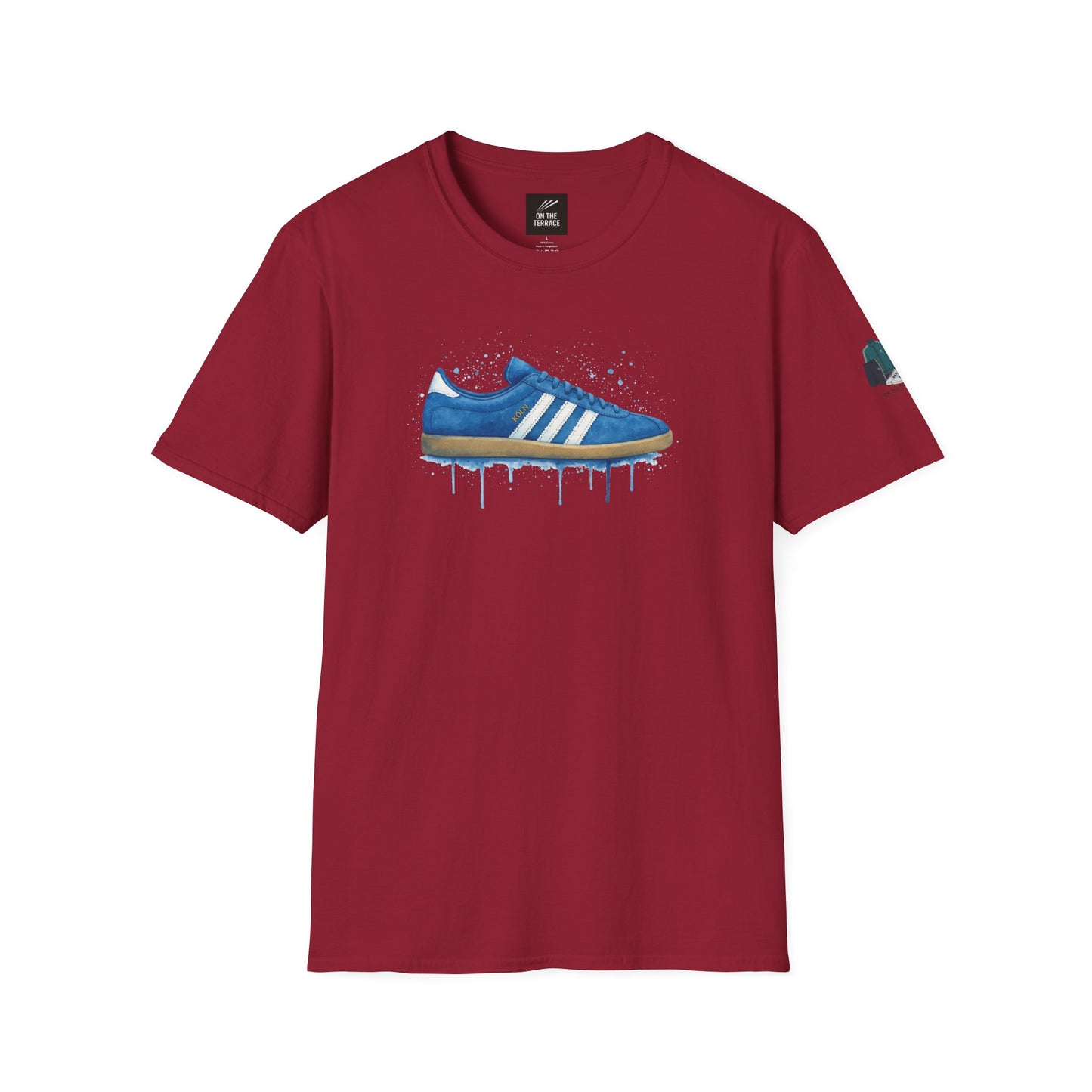 Burgundy t-shirt with a graphic of a blue Adidas sneaker and paint drip effect
