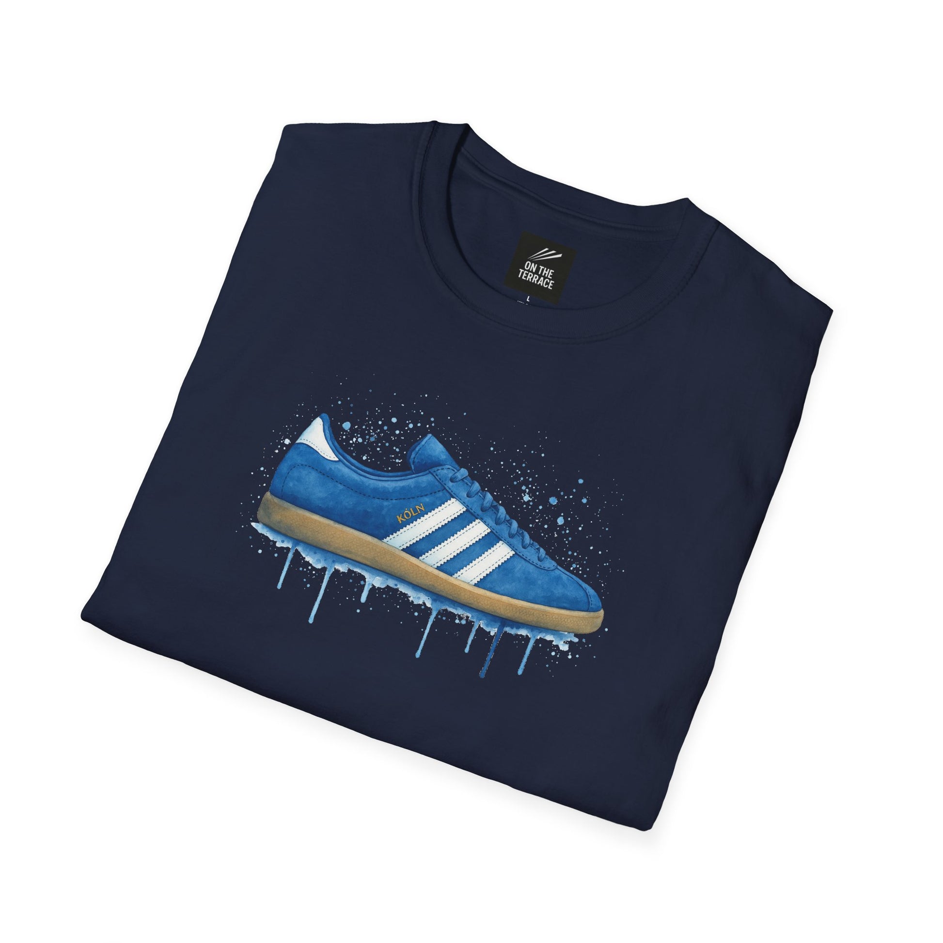 Navy blue t-shirt with graphic of blue and white sneaker labeled Köln and paint splatter design