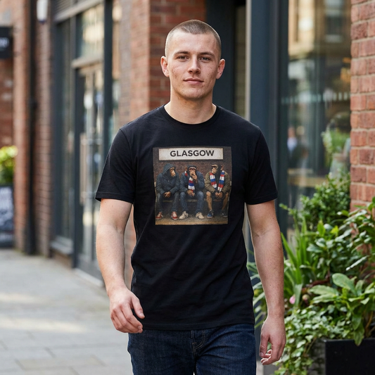Man wearing a black rangers northern monkeys t-shirt with 'Glasgow' design standing outdoors.