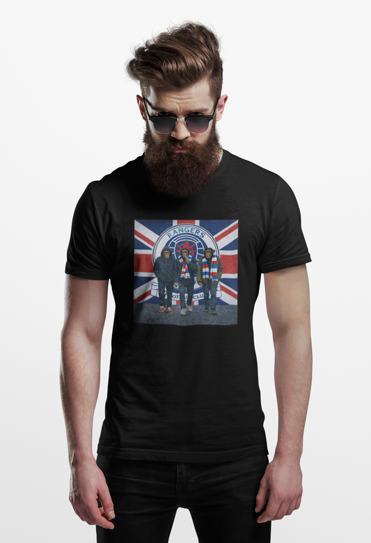 Man wearing a black Rangers northern monkeys t-shirt with a graphic design of a union jack with RFC crest on a white background