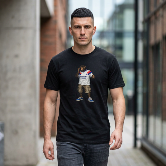 Man wearing a black Rangers Northern Monkeys t-shirt with a graphic design of a bear in a Rangers shirt, standing in an urban setting.