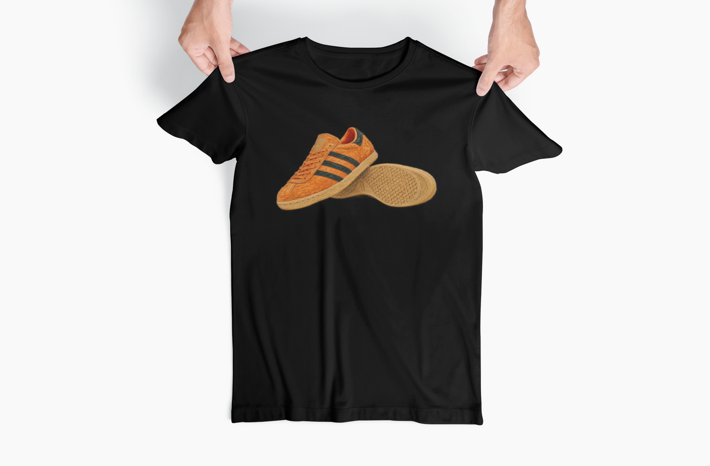 Black t-shirt with orange retro sneaker graphic print showing side and sole view