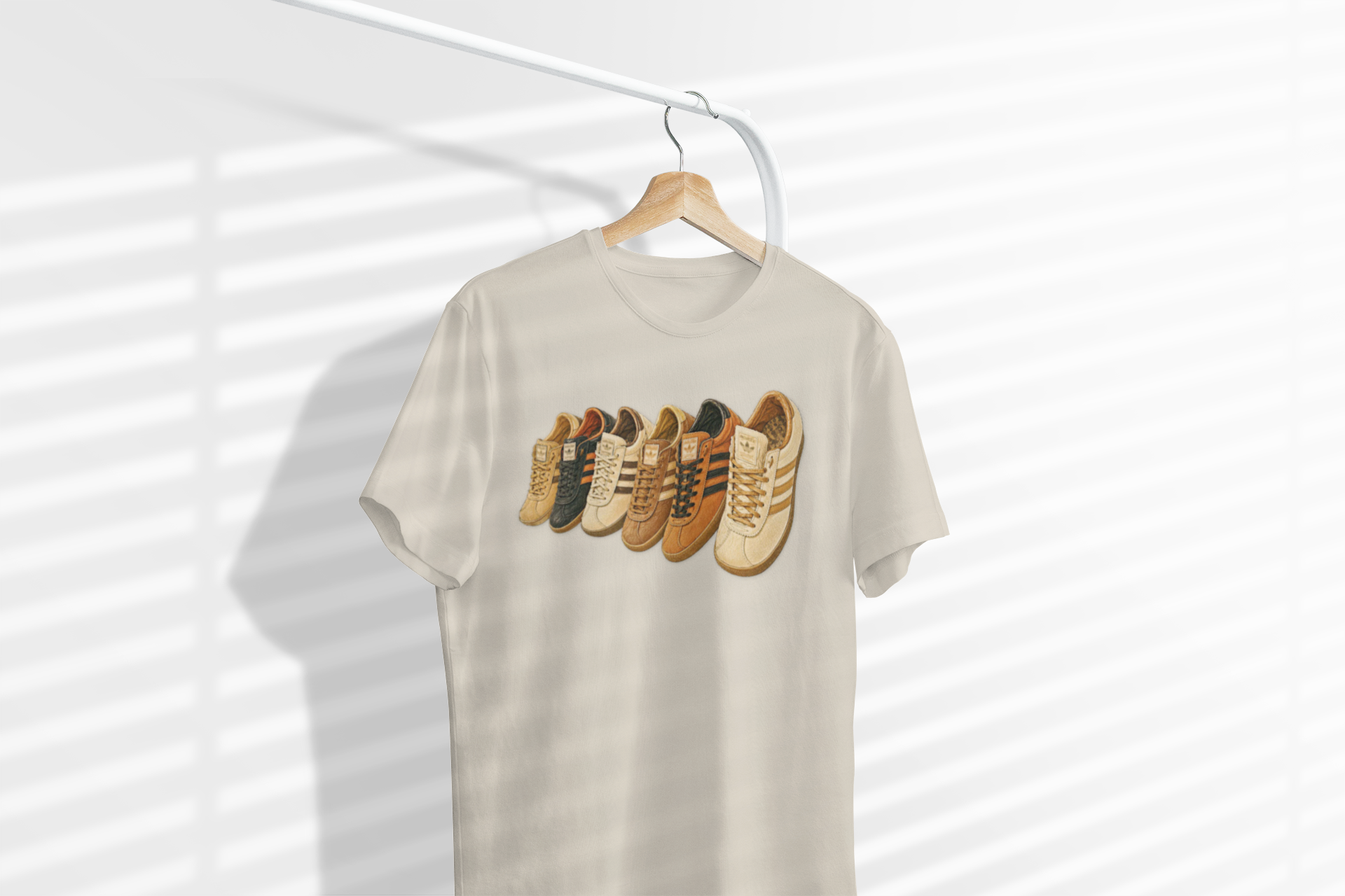 Beige multi retro sneaker graphic t-shirt with colorful vintage trainer collection print