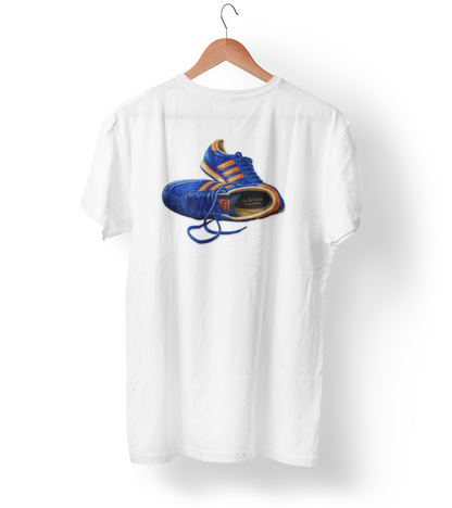 White t-shirt with illustration of blue and orange adidas Gazelle-style trainers, terrace casual sneaker graphic tee, vintage trainer collection, On The Terrace