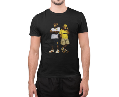 A man wearing a black short-sleeve Watford t-shirt with a graphic print of two men in streetwear on the front, set against a plain white background.