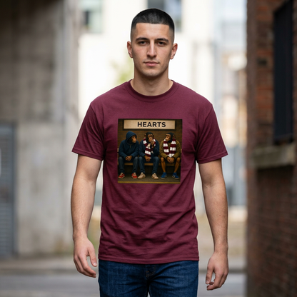 Hearts Terrace Monkeys maroon T-shirt with three supporter characters at a station