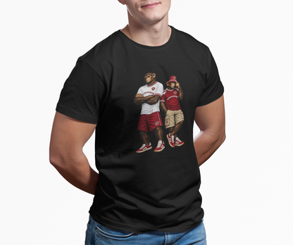A man wearing a black short-sleeve Hearts t-shirt with a graphic print of two basketball players on the front, set against a plain white background.