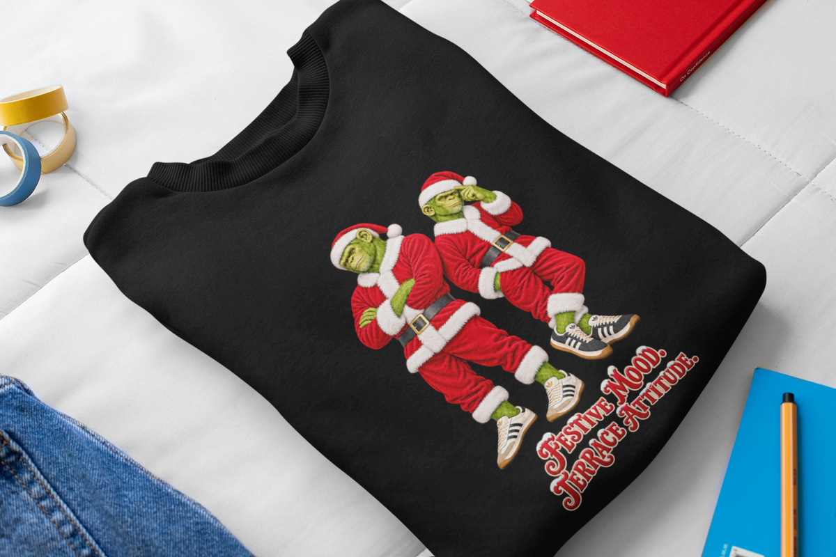 Folded black Christmas sweatshirt showing two Santa chimp casuals and red slogan