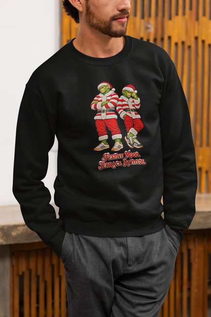 Man in grey trousers wearing the black red and white hooped Santa chimps Christmas jumper