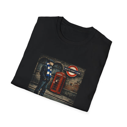 Black t-shirt with a graphic design of a person by a phone box and 'White Hart Lane' sign.