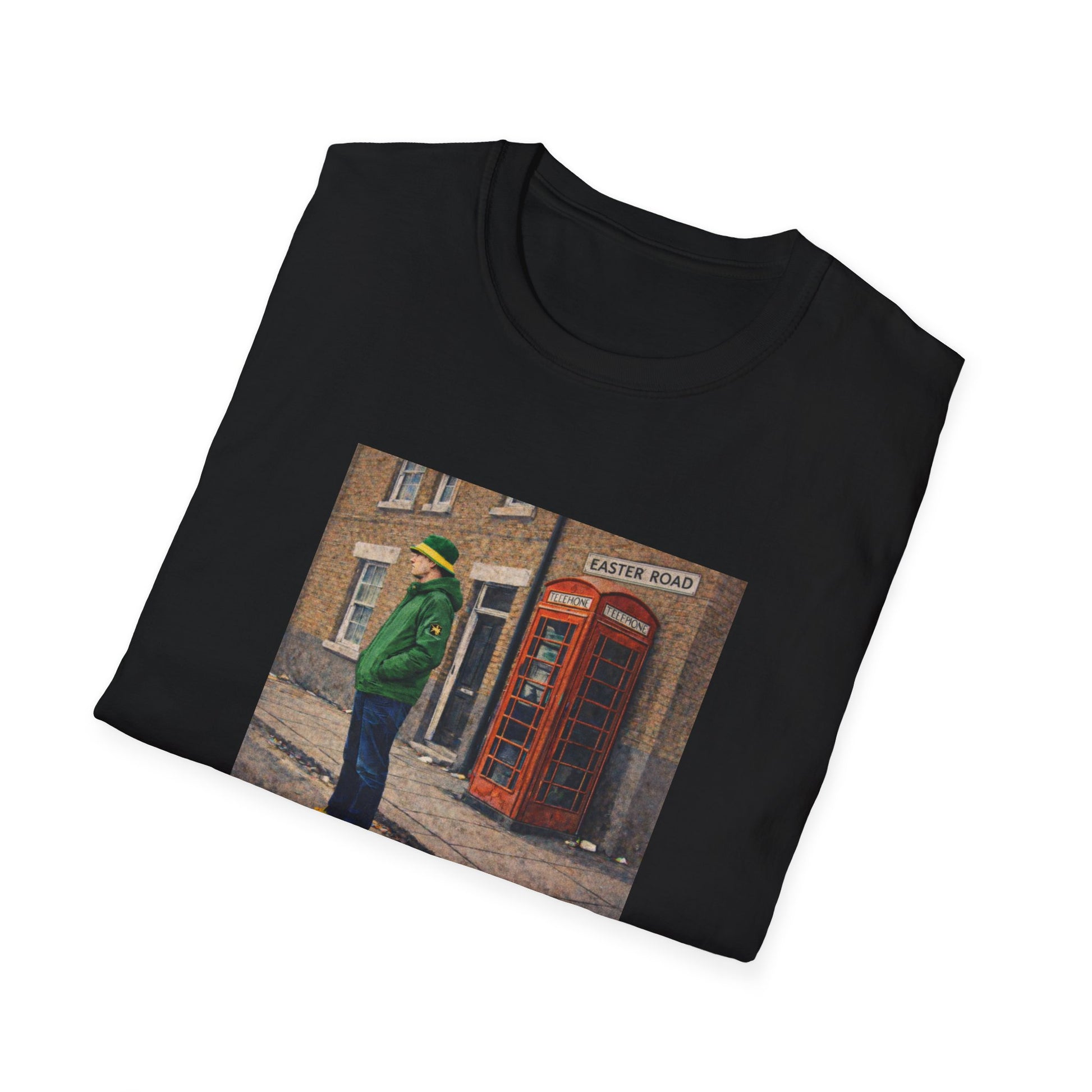 Black t-shirt with a printed design of a man in a green jacket and a red telephone box on a white background