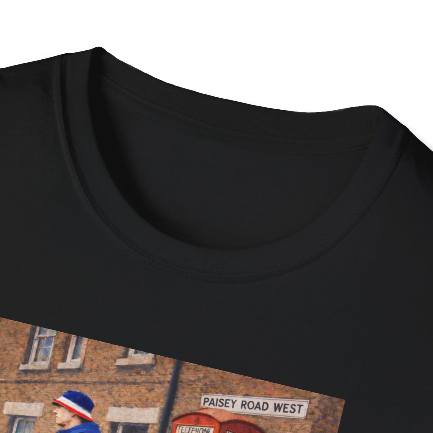 Close up of a Black Rangers t-shirt featuring a football casual design with a man in blue standing near a red British phone box on Paisey Road West