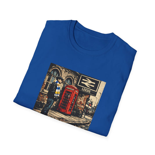 Leeds United Folded blue t-shirt with a graphic design of a red telephone box and 'Leeds' sign on a white background