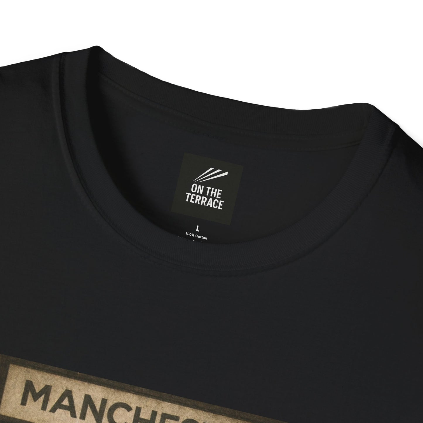Black t-shirt with 'On the Terrace' label and partial text 'MANCHESTER', on a white background.