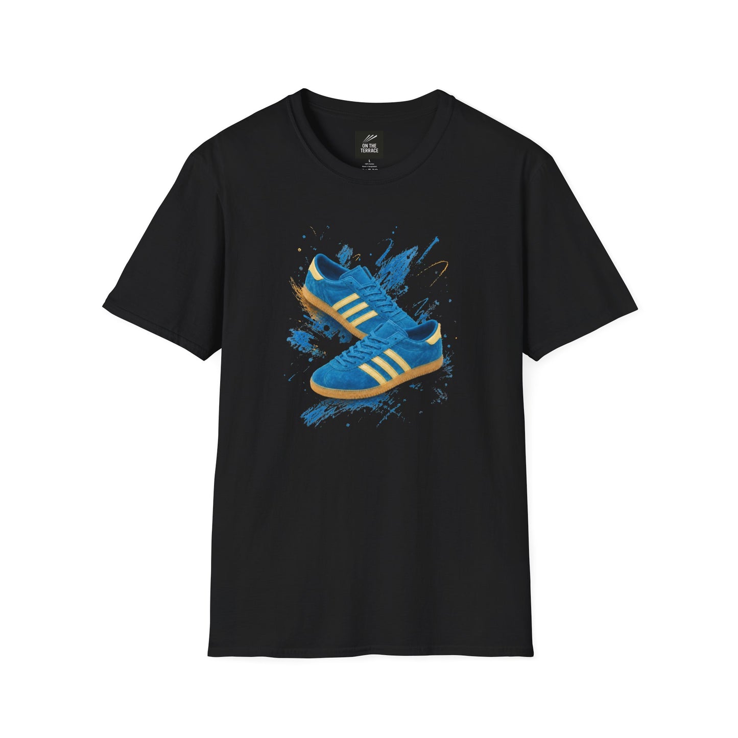 A black short-sleeve crewneck t-shirt featuring a graphic print of two blue Adidas sneakers with yellow stripes on a blue paint splatter background.
