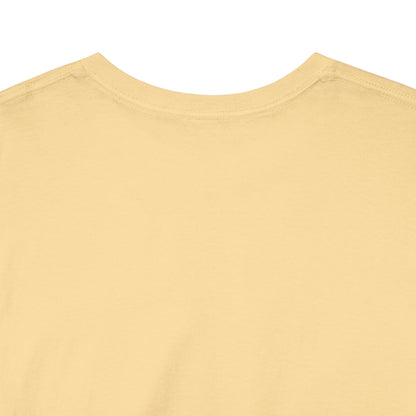Close-up of the crew neck and heavy cotton fabric on the pale yellow T-shirt