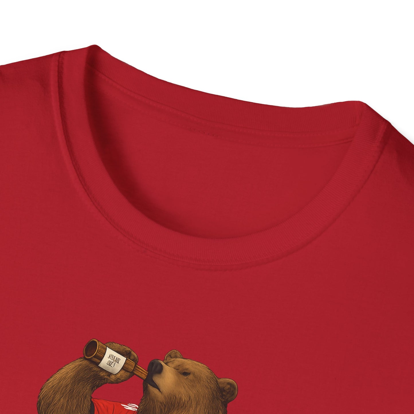 Close-up of red t-shirt with printed bear drinking from a bottle design