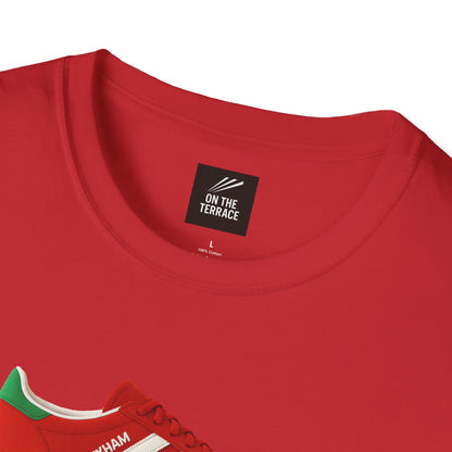 Red cotton t-shirt with On The Terrace label and part of red gym shoe with green detail