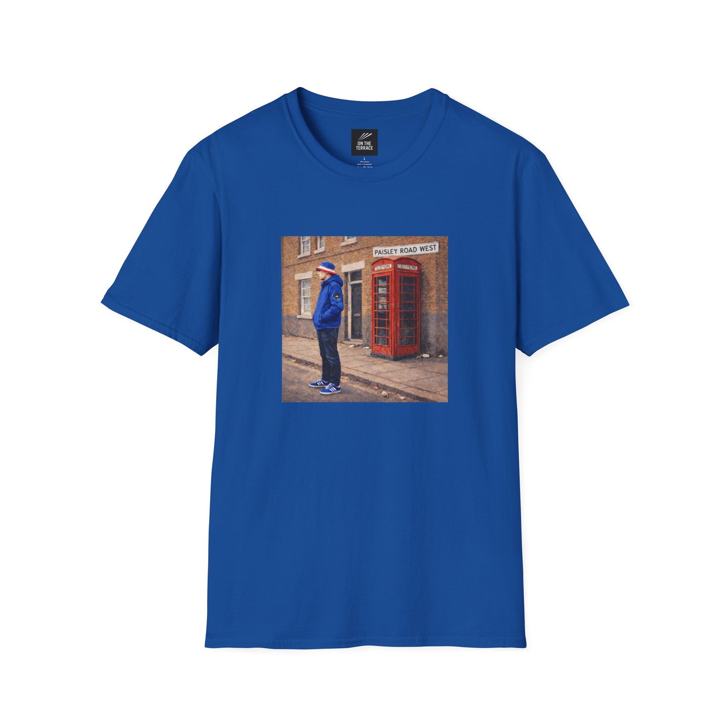 Blue t-shirt with a printed design of a person by a red phone box on a white background
