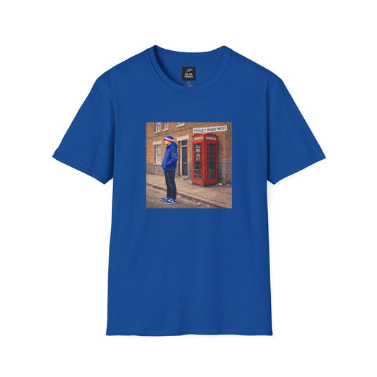 Blue t-shirt with a printed design of a person by a red phone box on a white background