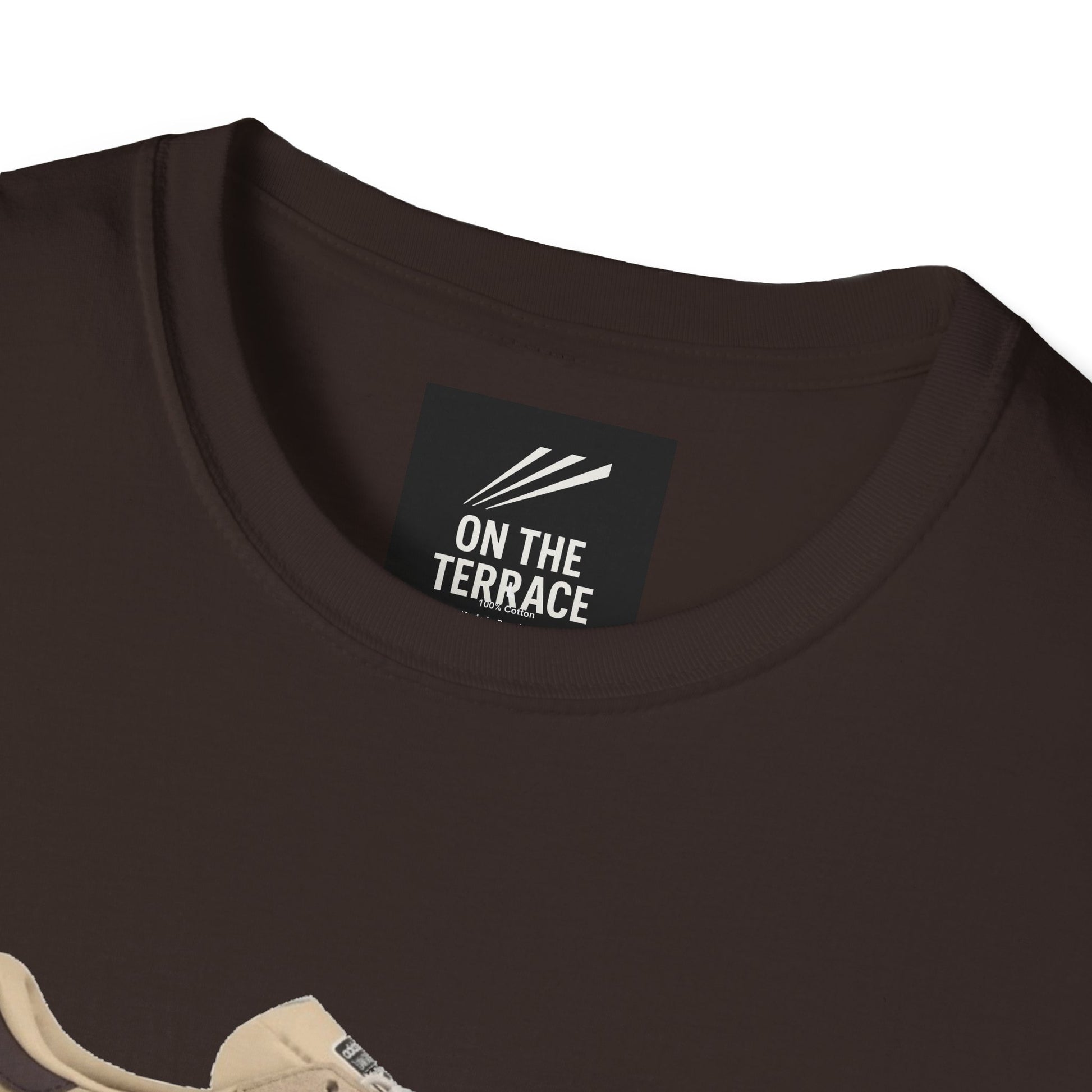 Close-up of dark brown crew neck t-shirt with On The Terrace brand label inside collar