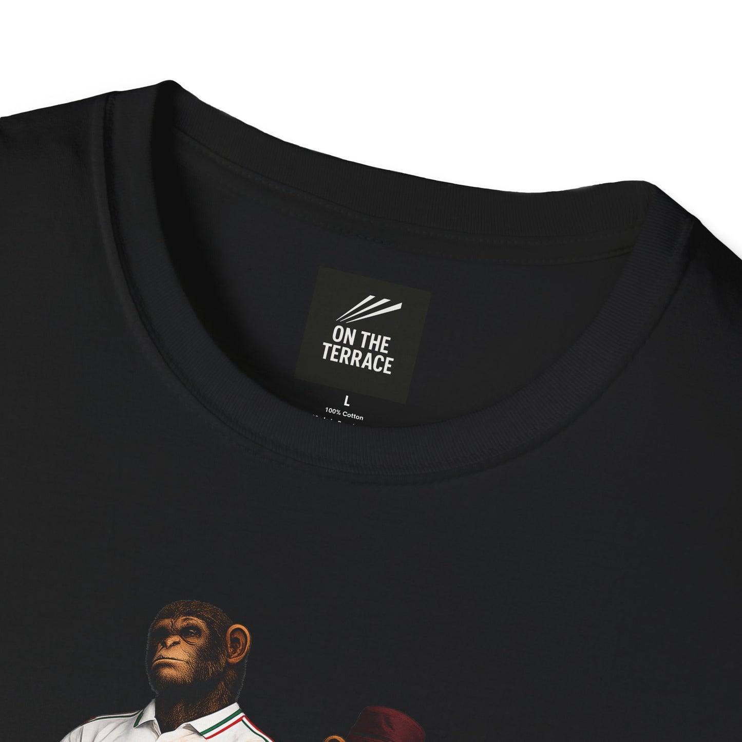 Folded black short-sleeved t-shirt featuring a central graphic of two chimpanzees styled as Wales national football team supporters. The chimpanzee on the left stands with arms crossed, wearing a white away jersey with green and red trim on the collar and a red dragon crest. The chimpanzee on the right wears the classic red Wales home jersey featuring a prominent green and white horizontal chest stripe, paired with khaki cargo shorts and a burgundy bucket hat
