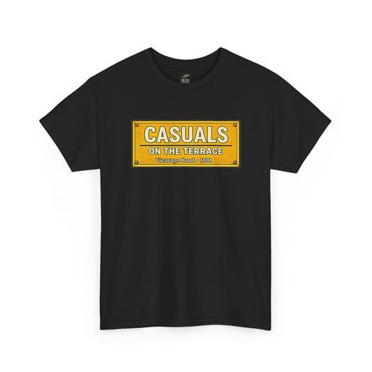 A black short-sleeve Watford t-shirt featuring a yellow rectangular graphic on the chest that reads 'CASUALS ON THE TERRACE Vintage Tees - 1984' in white and yellow lettering, displayed against a solid white background.
