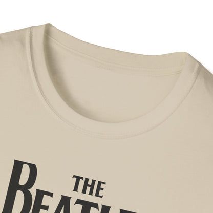 Close up of a t-shirt with 'The Beatles' logo on a white background