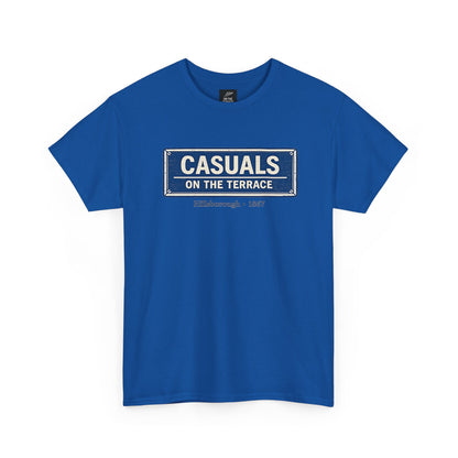 A a royal blue heavy cotton  SWFC t-shirt flat lay featuring a central vintage blue and white street sign graphic reading "CASUALS ON THE TERRACE" with "Hillsborough • 1867" printed below, and an inner neck label for On The Terrace, shown on a plain white background.
