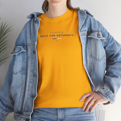 Woman in a denim jacket wearing the gold Sheffield Wednesday slogan tee