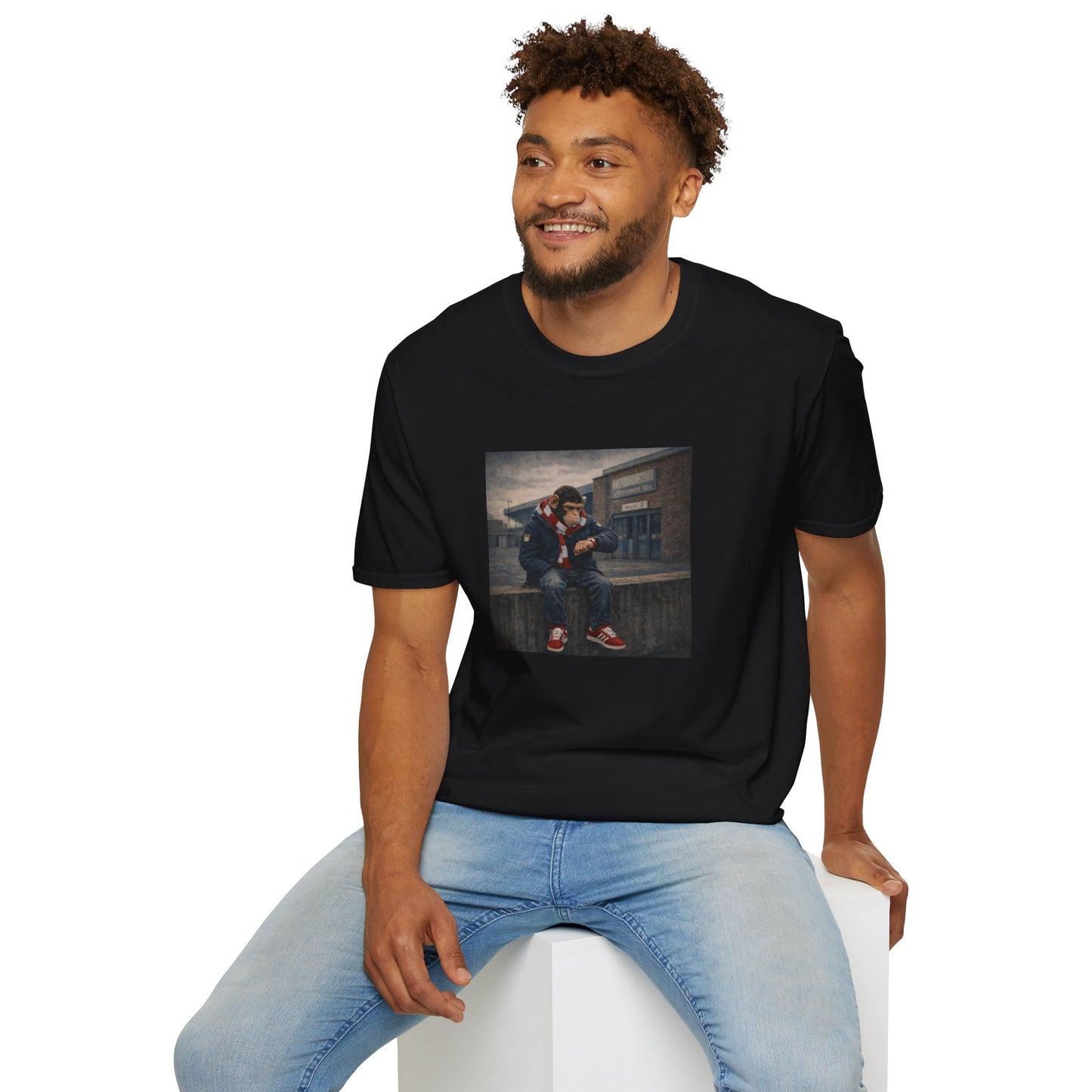 Man wearing a black northern monkeys  t-shirt  graphic on a white background