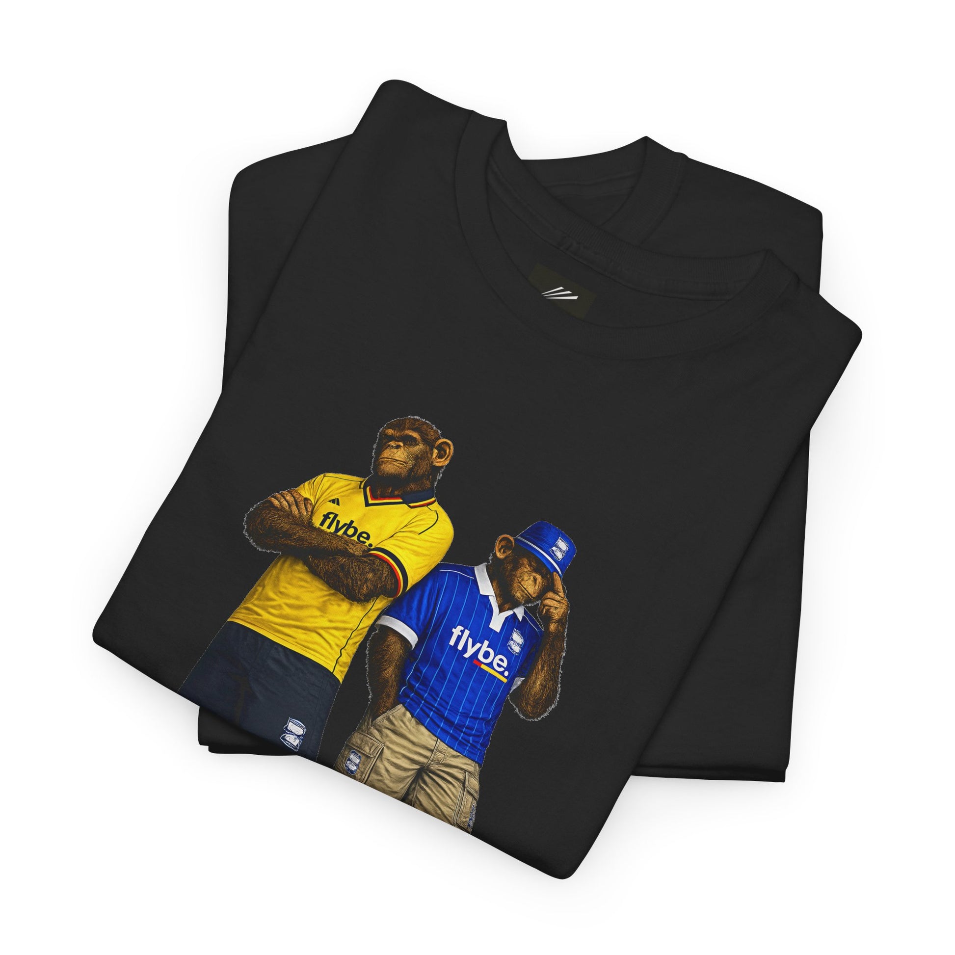 A folded black Birmingham t-shirt featuring a graphic print of two apes wearing sports jerseys, one in yellow with 'flybe' on the chest and one in blue with 'flybe' on the front, set against a plain white background.