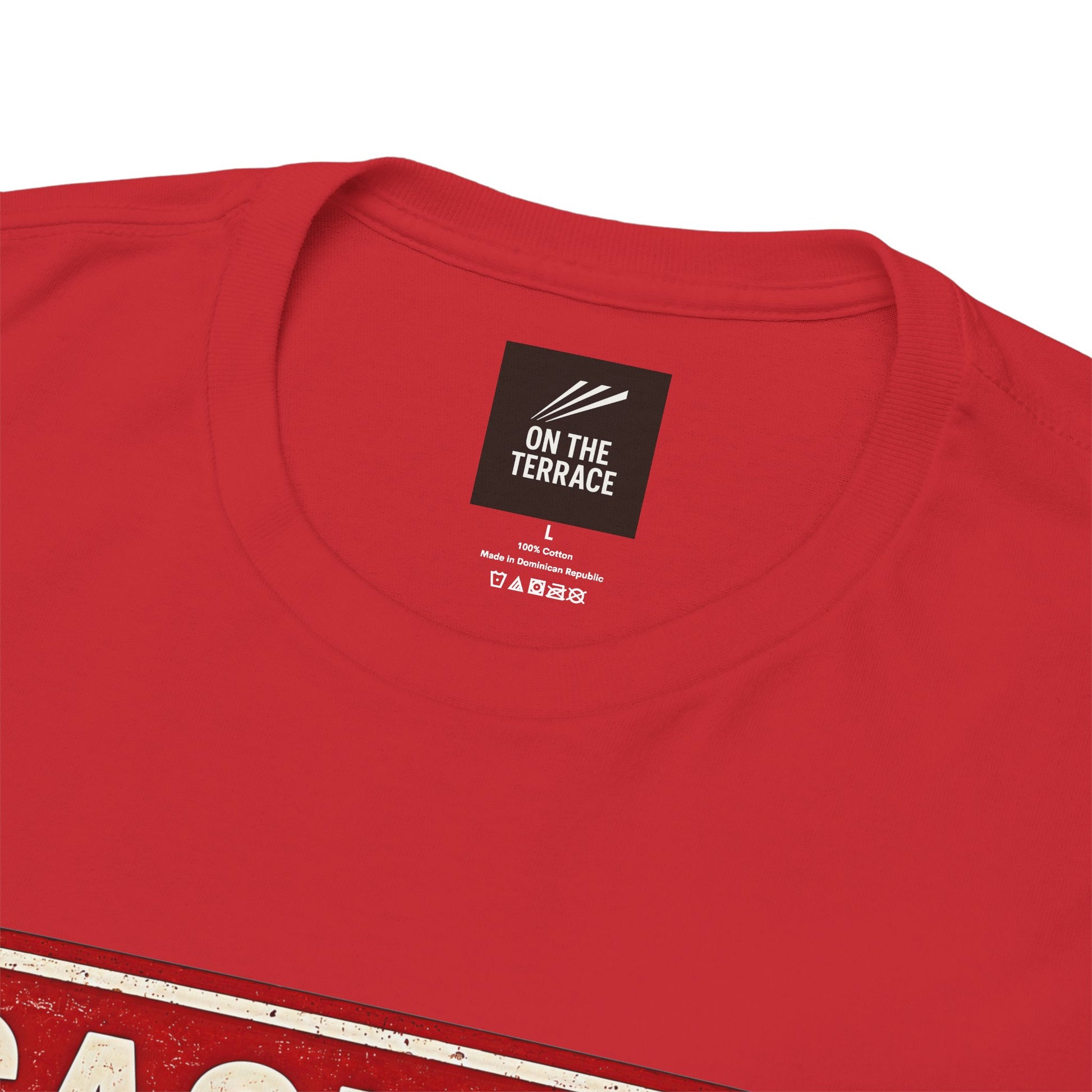 Close-up of a red short-sleeve SUFC t-shirt showing the inner neck label which reads 'ON THE TERRACE'.