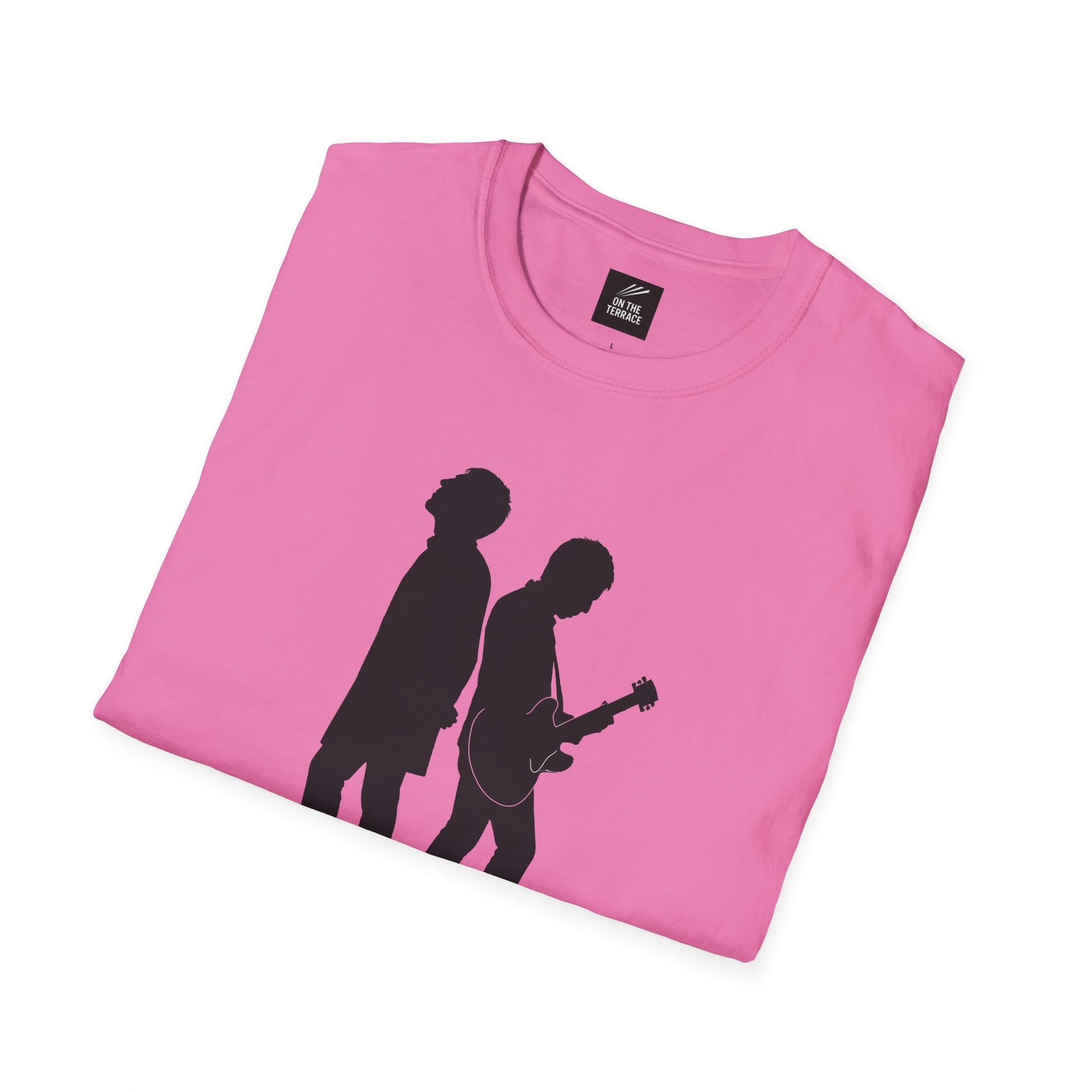 Pink folded T-shirt with black silhouette of two musicians, one playing guitar, on front