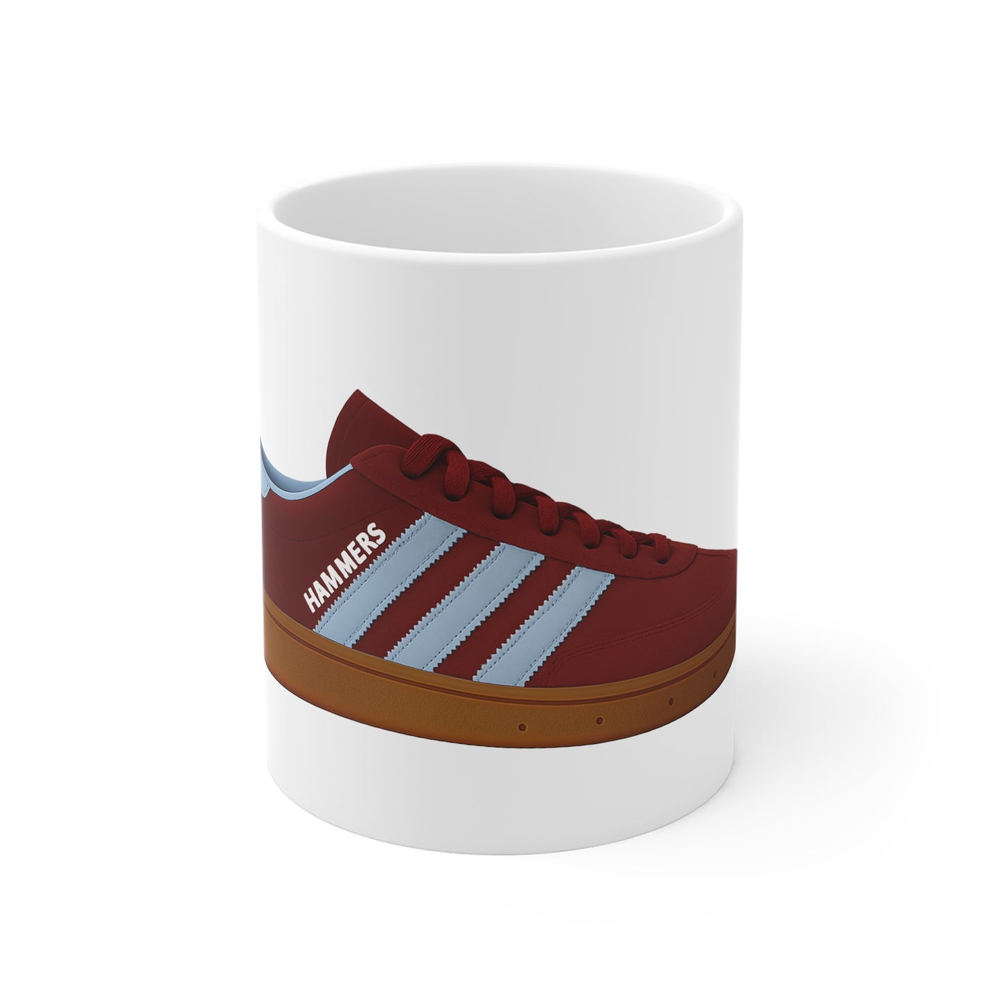 White mug featuring a maroon sneaker with light blue stripes and brown sole, labeled Hammers