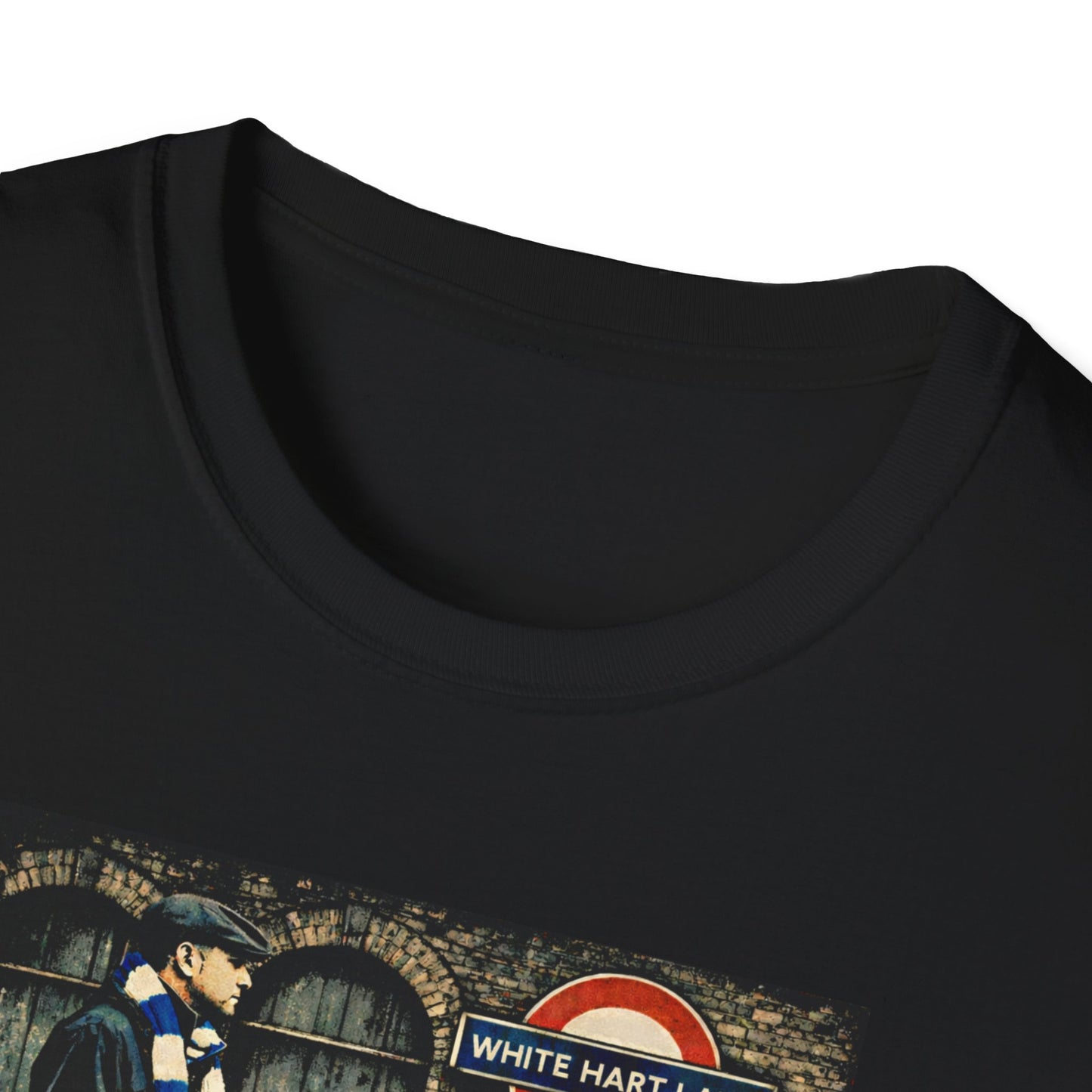 Close up of a Black Spurs t-shirt with graphic of football casual man standing near red phone booth and White Hart Lane sign