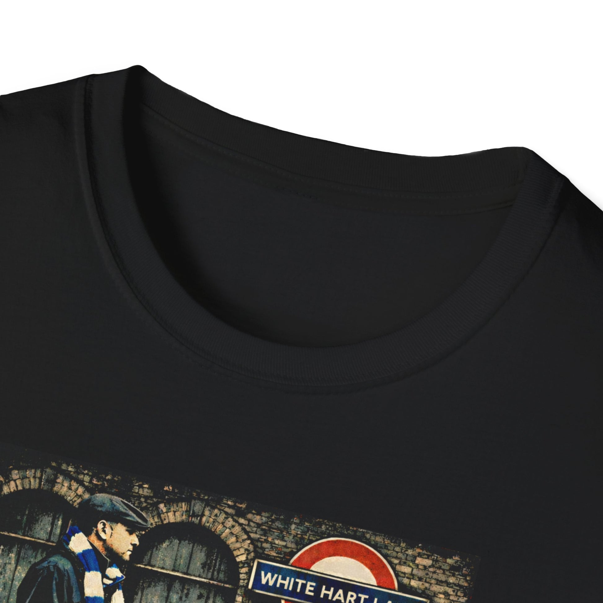 Close up of a Black Spurs t-shirt with graphic of football casual man standing near red phone booth and White Hart Lane sign