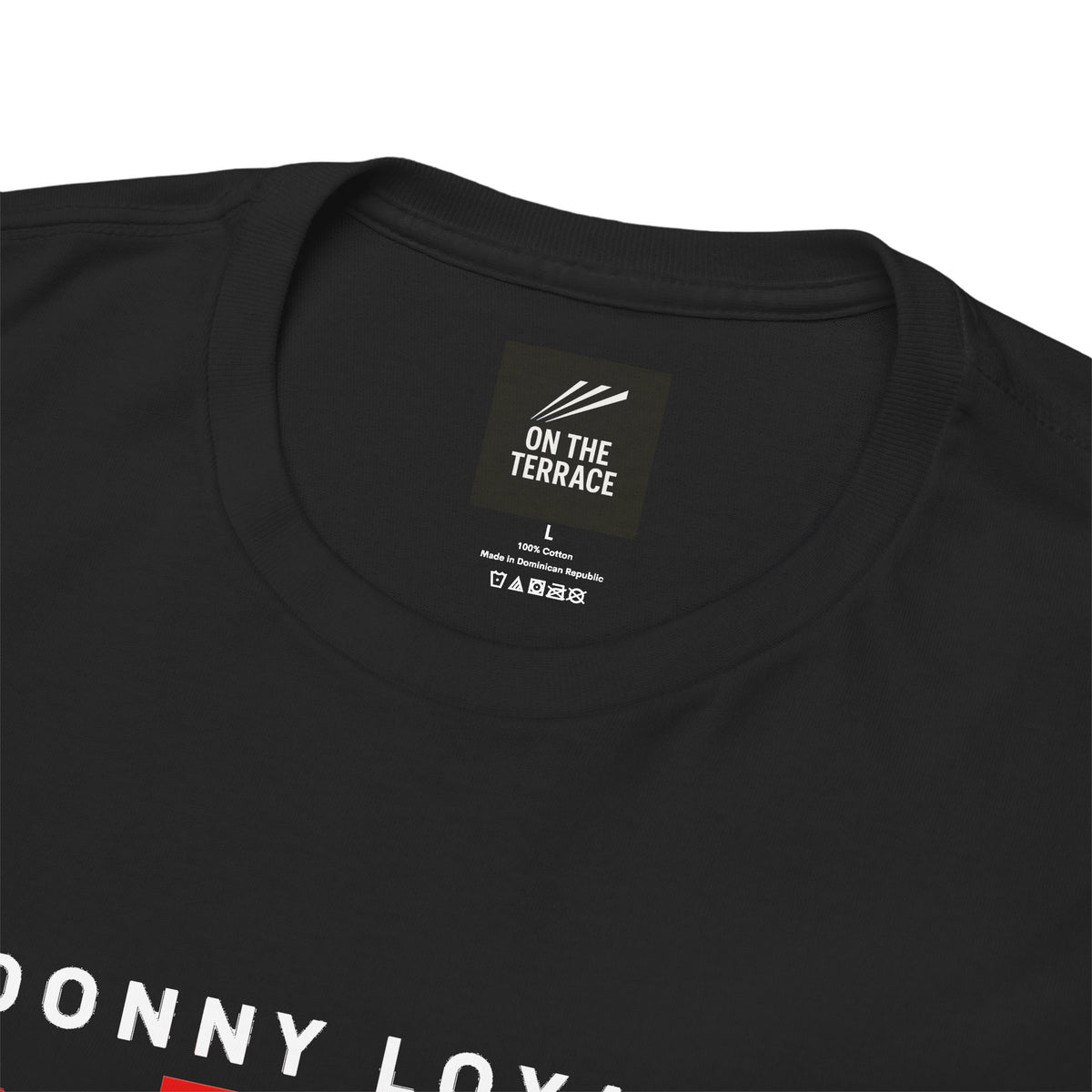 Close-up of On The Terrace neck label on black heavy cotton Doncaster Rovers tee