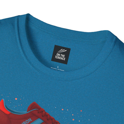 Blue crew neck t-shirt with red sneaker graphic and casual wear label close-up