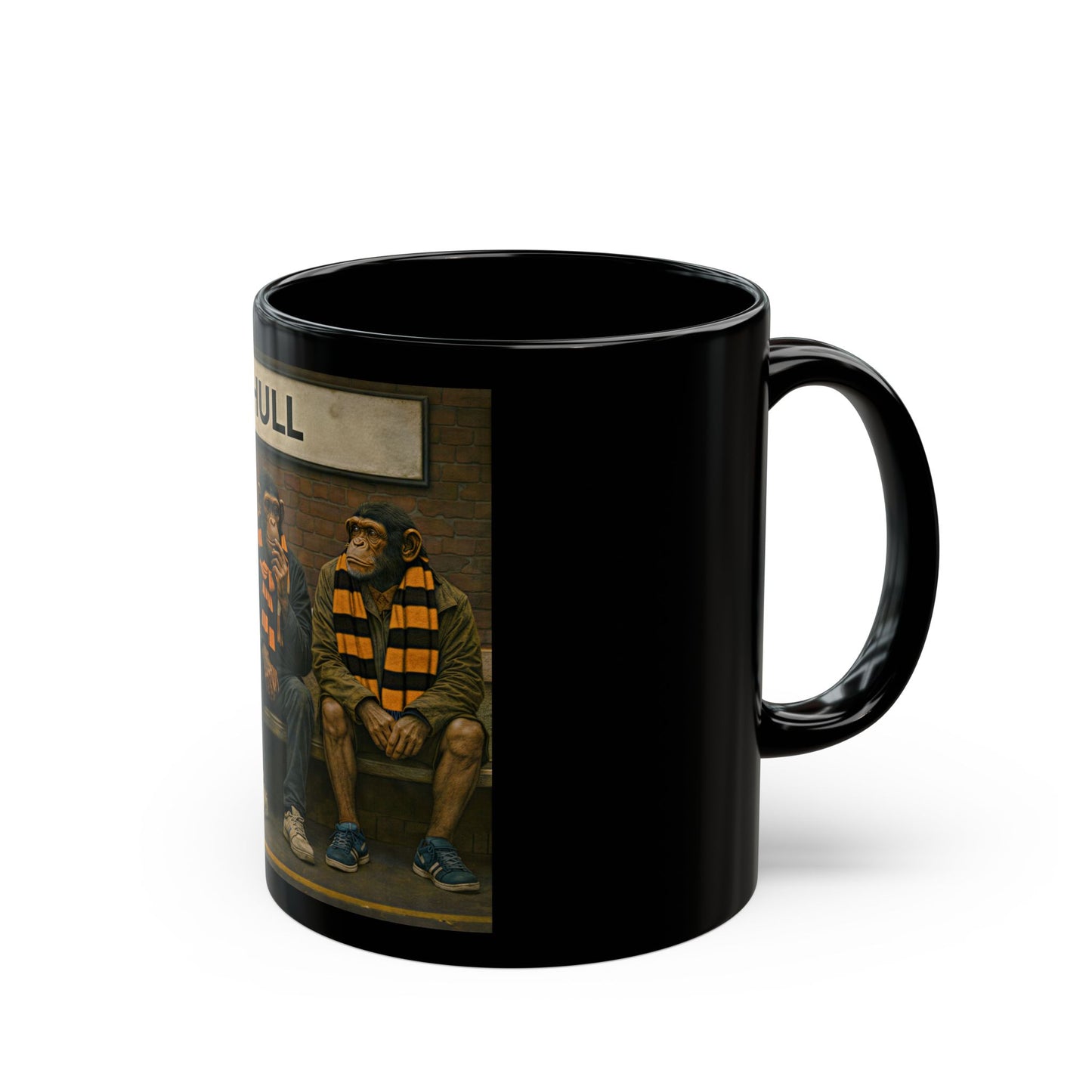 Black mug with a graphic of a monkey wearing a scarf on a white background