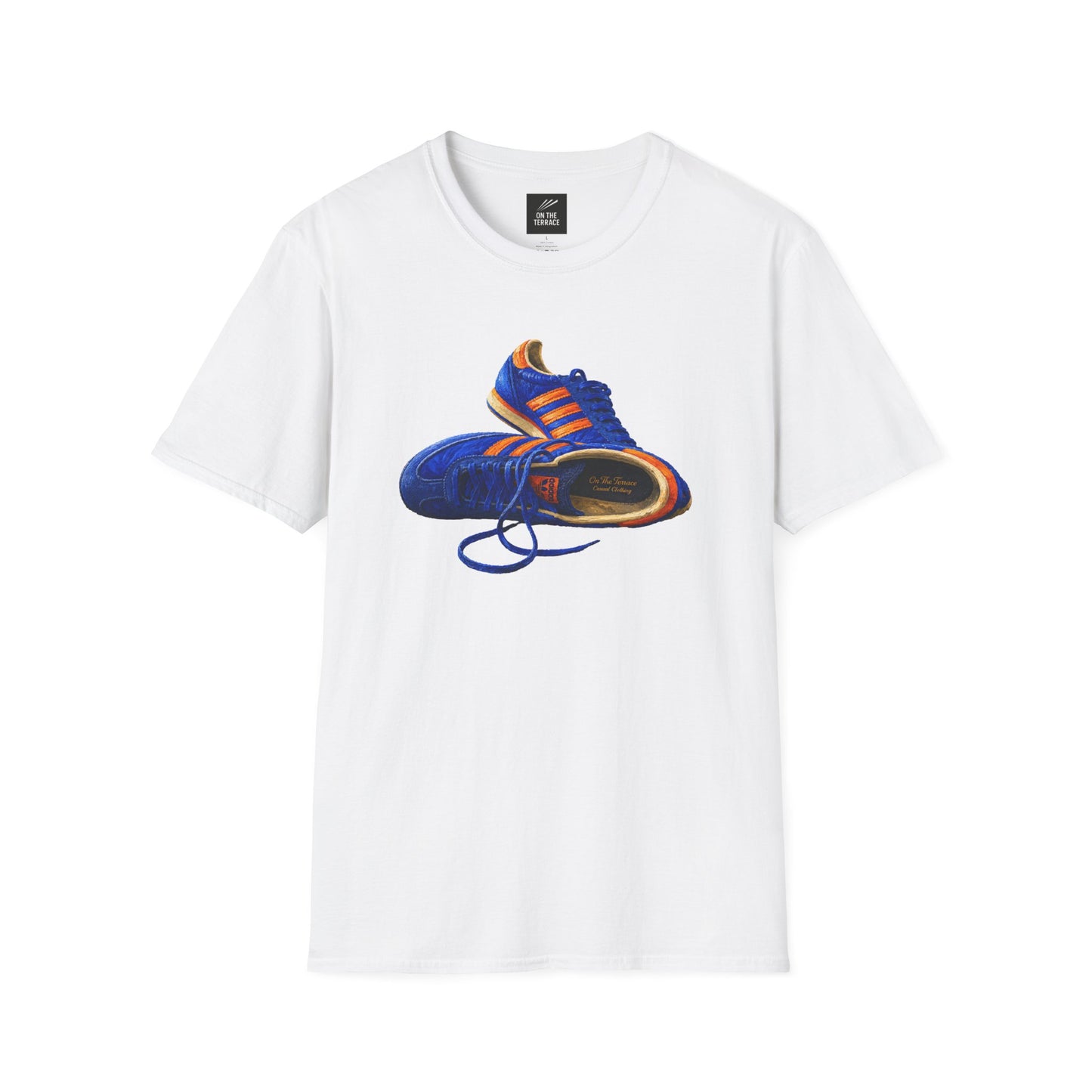 White t-shirt with illustration of blue and orange adidas Gazelle-style trainers, terrace casual sneaker graphic tee, vintage trainer collection, On The Terrace