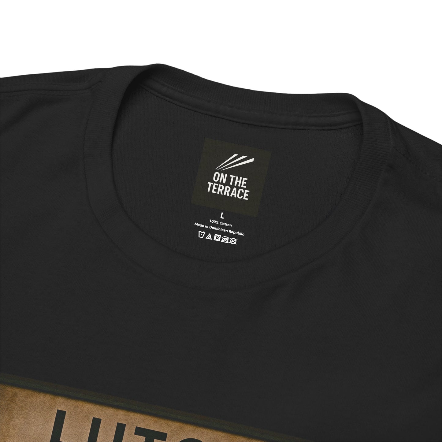 Close-up of a black short-sleeve Luton t-shirt showing the inner neck label which reads 'ON THE TERRACE'.
