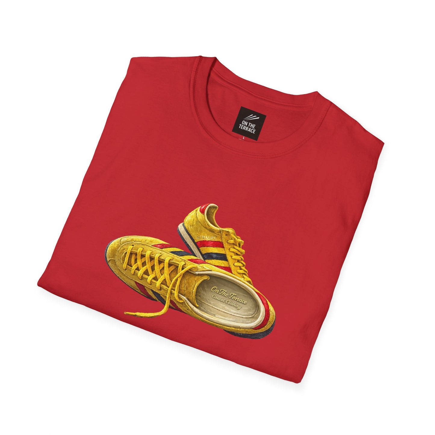 A folded red t-shirt with hand-illustrated yellow, navy and red retro terrace trainer sneaker graphic print, On The Terrace casual clothing brand
