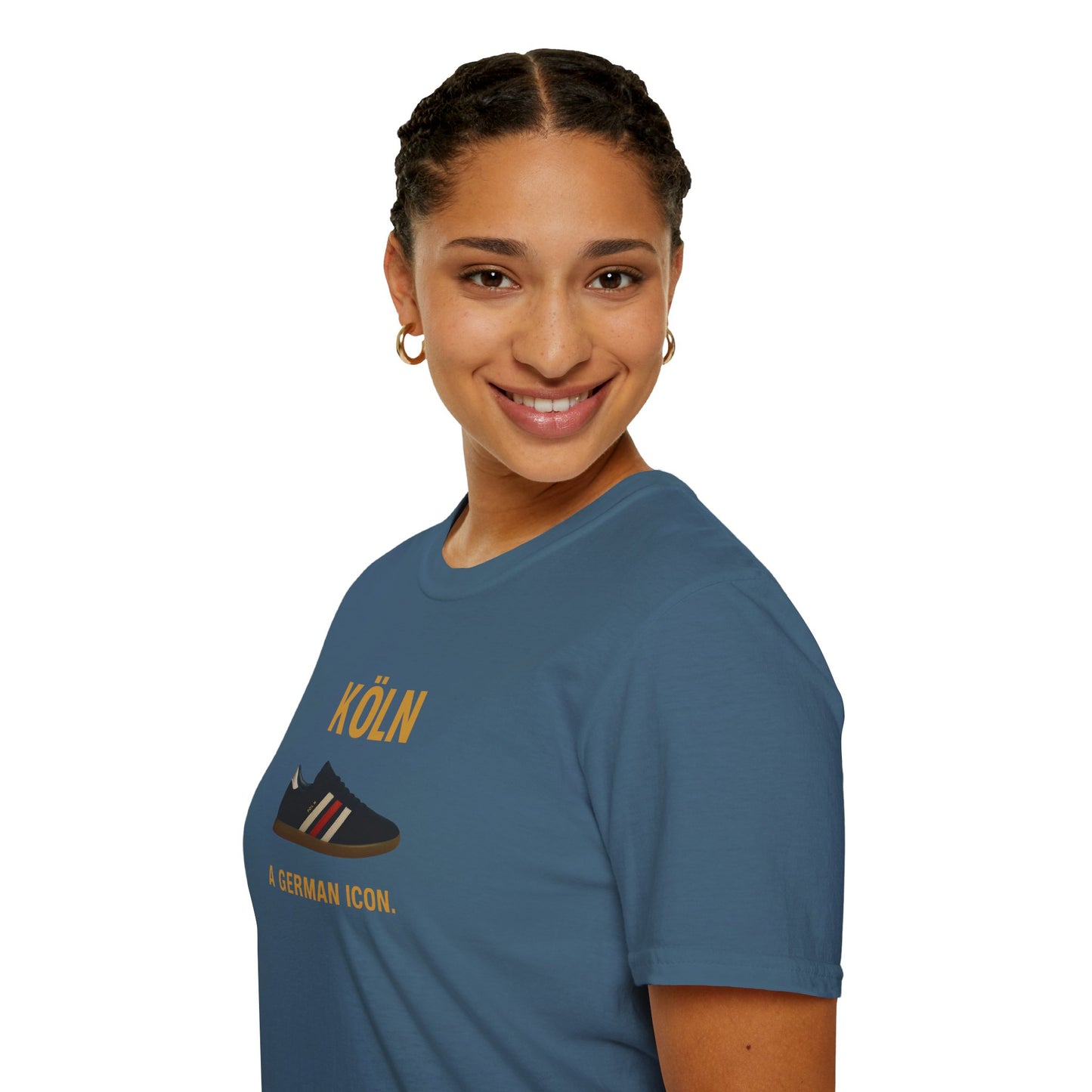 Smiling woman wearing blue T-shirt with Köln sneaker graphic and text A German Icon