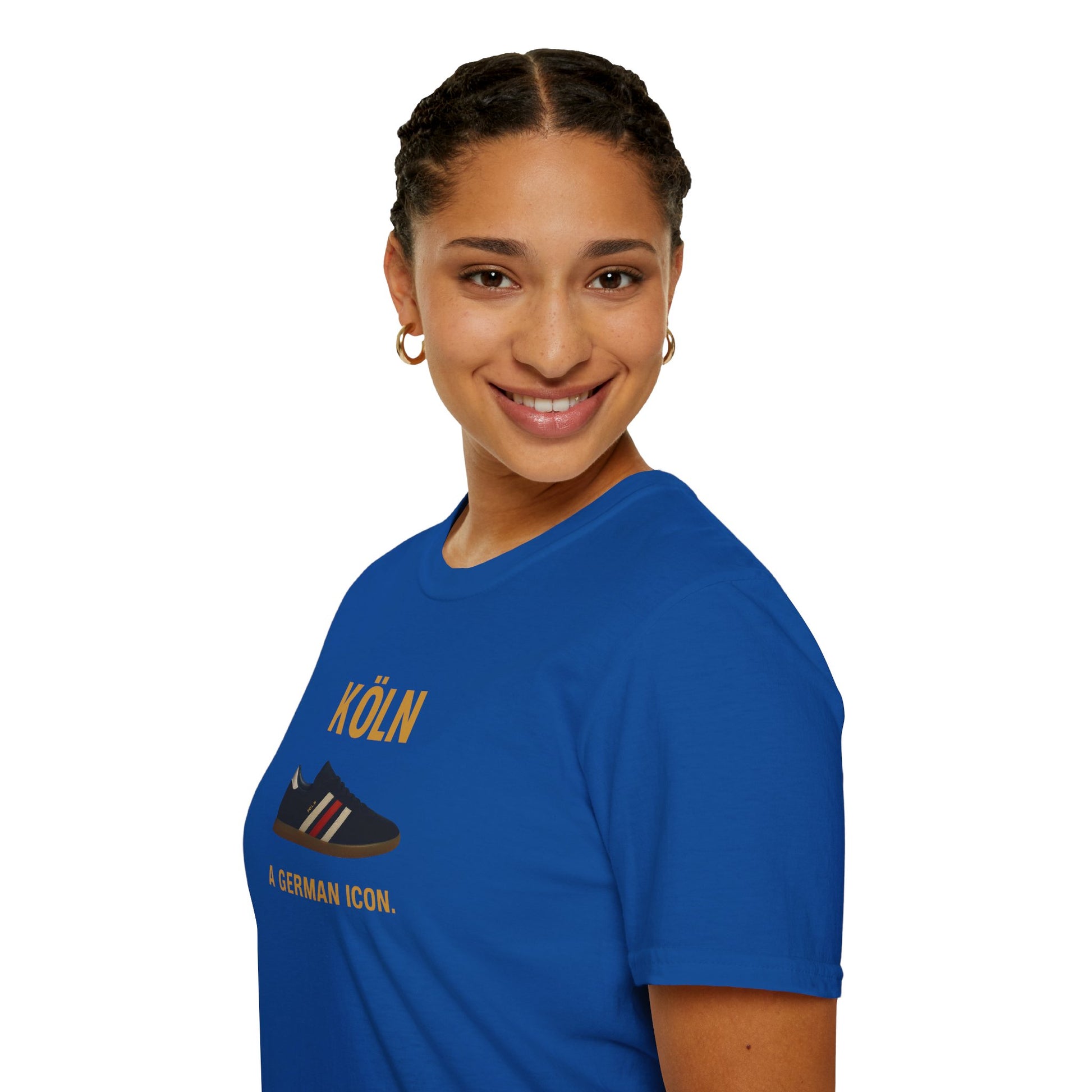 Smiling woman wearing blue T-shirt with graphic shoe and text KÖLN A German Icon on white background