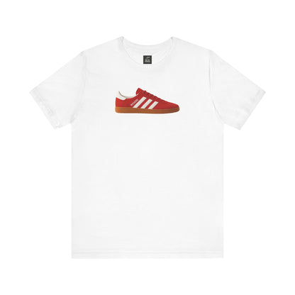 White T-shirt featuring a red sneaker graphic with white stripes and gum sole