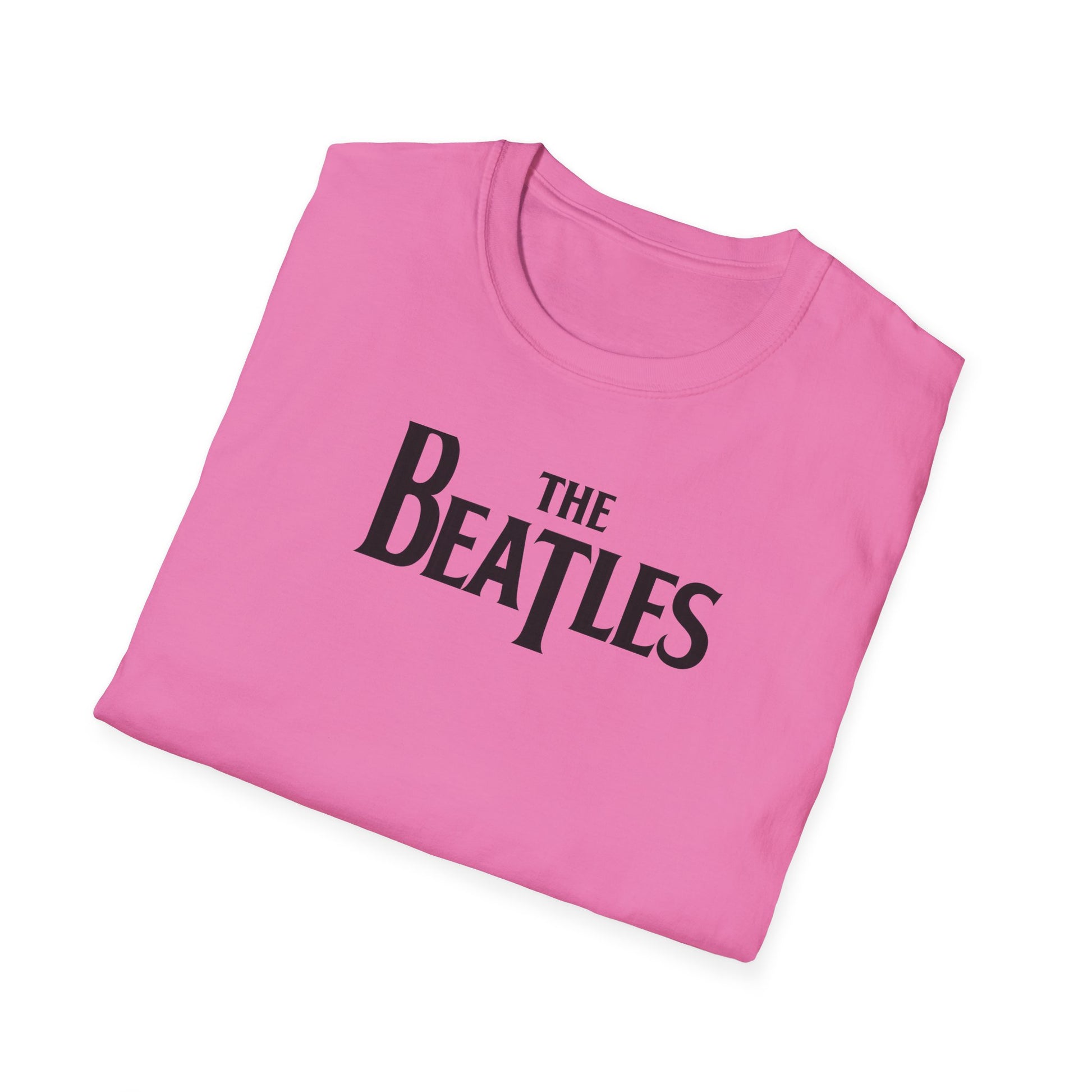 Close up of a t-shirt with 'The Beatles' logo on a white background