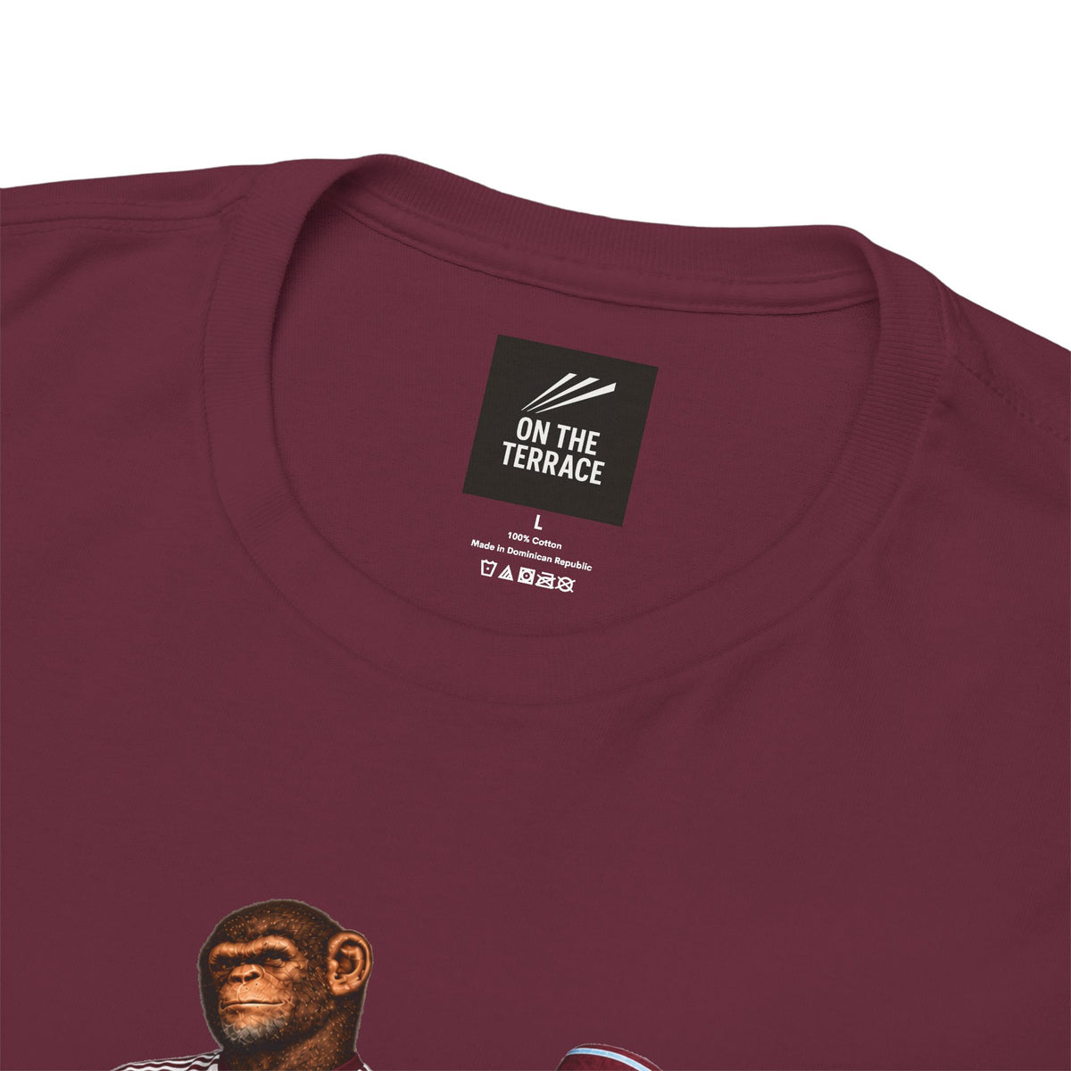 Close-up of the neck label on the maroon Hearts Monkeys Duo tee